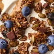 Purely Elizabeth Ancient Grain Protein Granola Dark Chocolate Blueberry Lifestyle 1