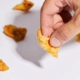 Holding Flock Chicken Skin Crisps Original