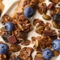 Purely Elizabeth Ancient Grain Protein Granola Dark Chocolate Blueberry Lifestyle 1